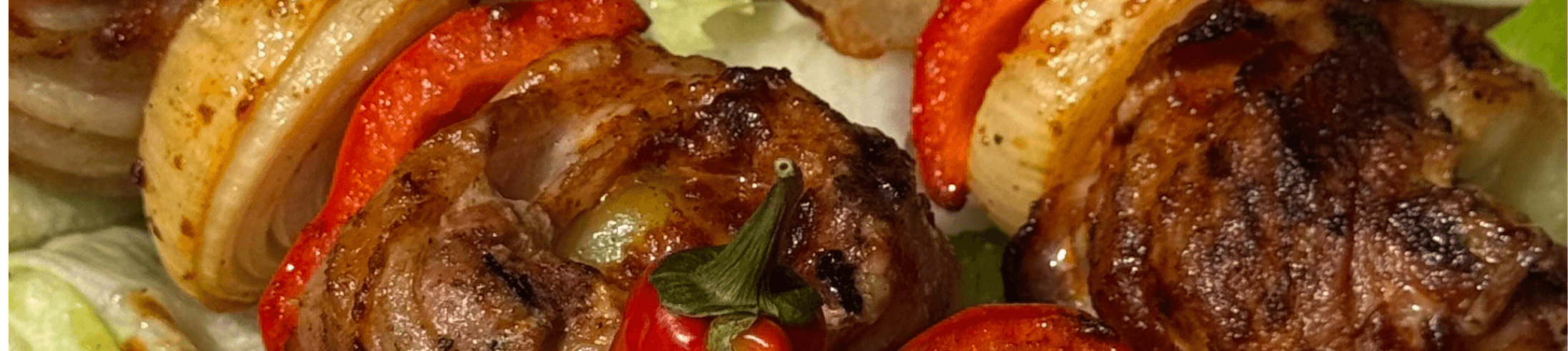 Szaszłyk z karkówki zawijany w boczek